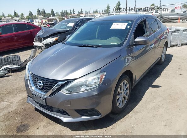3N1AB7AP1KY409686 2019 NISSAN SENTRA Серый Передняя левая четверть