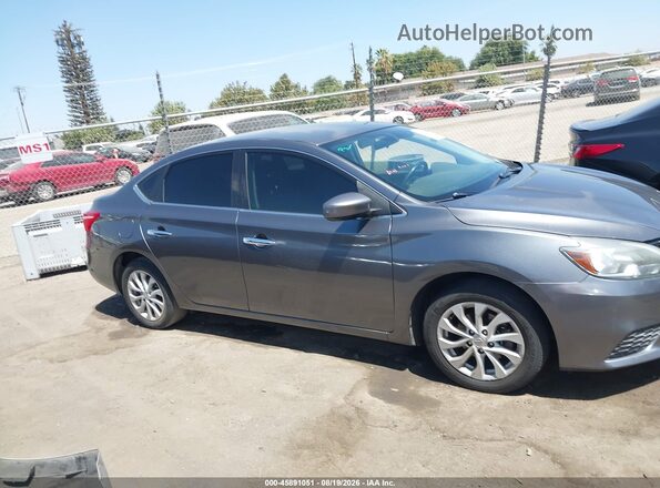 3N1AB7AP1KY409686 2019 NISSAN SENTRA Серый Вид задней части салона