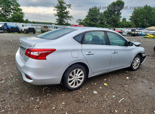 3N1AB7AP1KY454983 2019 NISSAN SENTRA Silver Trasero derecho