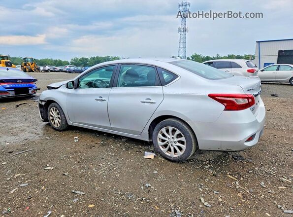 3N1AB7AP1KY454983 2019 NISSAN SENTRA Silver Trasero izquierdo