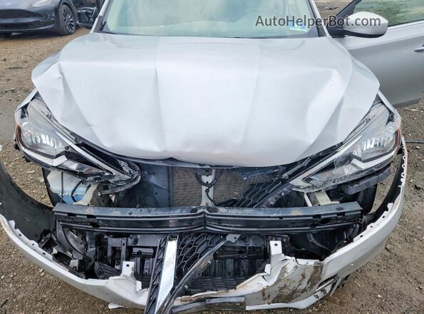 3N1AB7AP1KY454983 2019 NISSAN SENTRA Silver Vista interior trasera