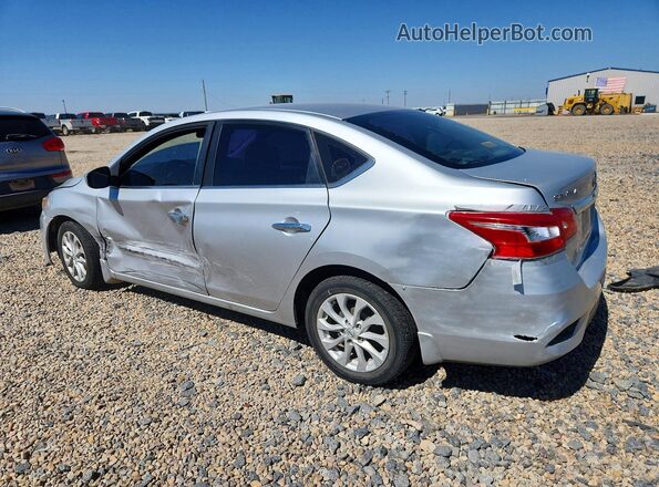 3N1AB7AP2KY202093 2019 NISSAN SENTRA Silver Trasero izquierdo