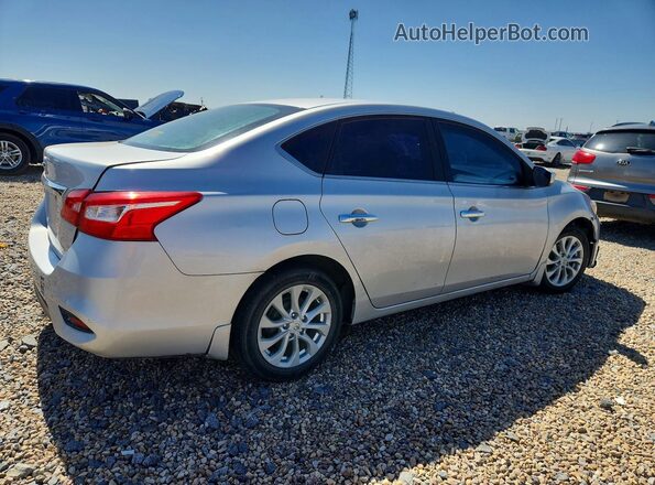 3N1AB7AP2KY202093 2019 NISSAN SENTRA Silver Trasero derecho