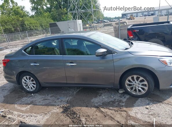 3N1AB7AP2KY340877 2019 NISSAN SENTRA Серый Вид задней части салона