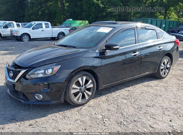 3N1AB7AP3JY263788 2018 NISSAN SENTRA Black Widok wnętrza z tyłu