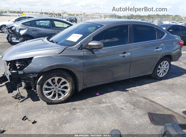 3N1AB7AP3JY297293 2018 NISSAN SENTRA Gray Vista tres cuartos delantera izquierda