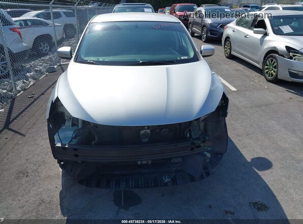 3N1AB7AP3KY325675 2019 NISSAN SENTRA Silver Вид задньої частини салону