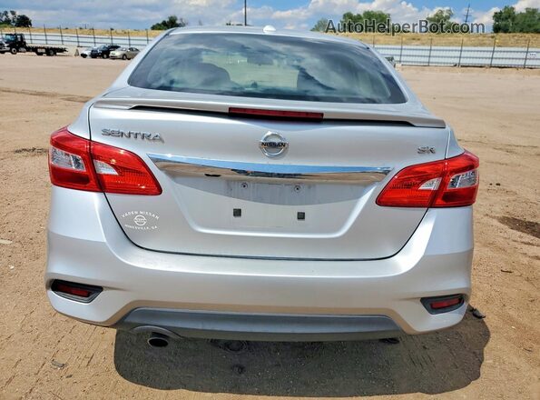 3N1AB7AP4GY235281 2016 NISSAN SENTRA Серебряный Вид сзади