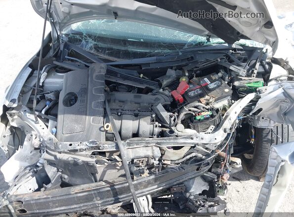 3N1AB7AP4JY216463 2018 NISSAN SENTRA Gray Vista trasera