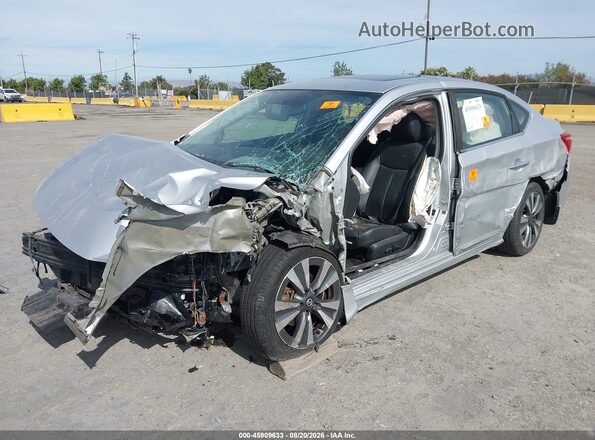3N1AB7AP4JY216463 2018 NISSAN SENTRA Gray Vista tres cuartos delantera izquierda