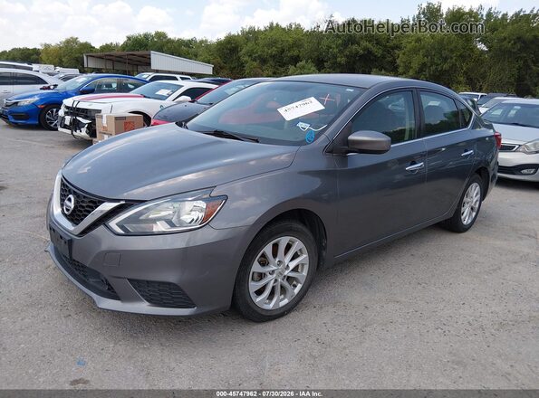 3N1AB7AP4KY280567 2019 NISSAN SENTRA Gray Vista tres cuartos delantera izquierda