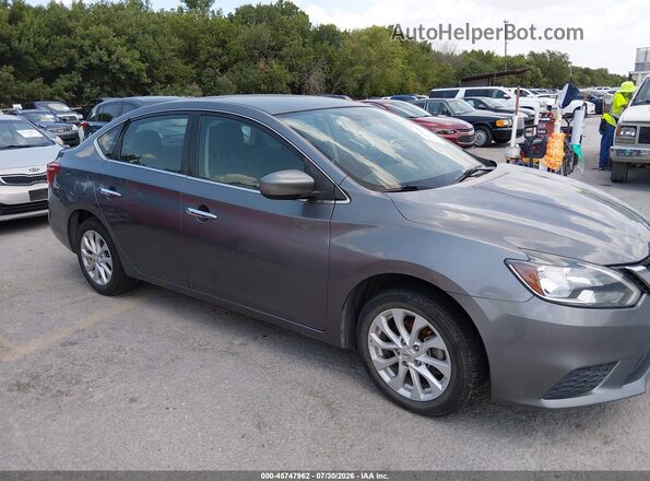 3N1AB7AP4KY280567 2019 NISSAN SENTRA Gray Vista interior trasera