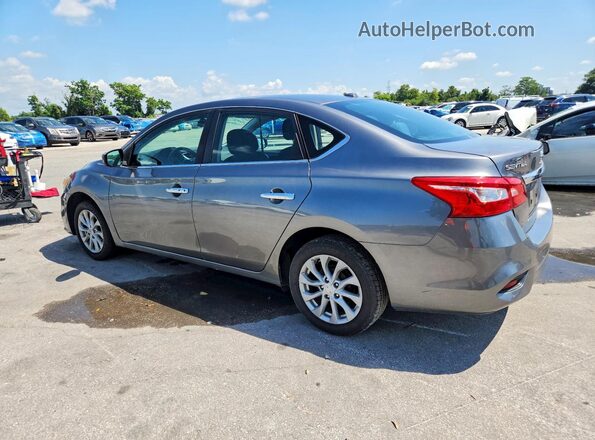 3N1AB7AP4KY457067 2019 NISSAN SENTRA Silver Rear left