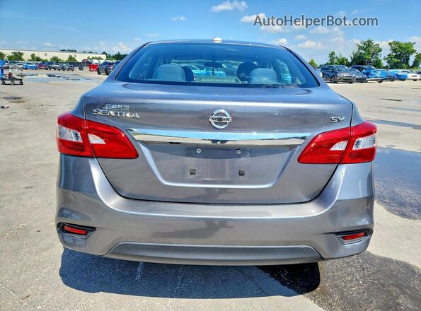 3N1AB7AP4KY457067 2019 NISSAN SENTRA Silver Rear view