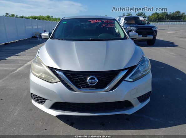 3N1AB7AP5HY359903 2017 NISSAN SENTRA Серебряный Вид задней части салона