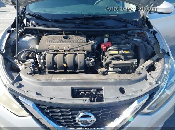 3N1AB7AP5HY359903 2017 NISSAN SENTRA Серебряный Вид сзади
