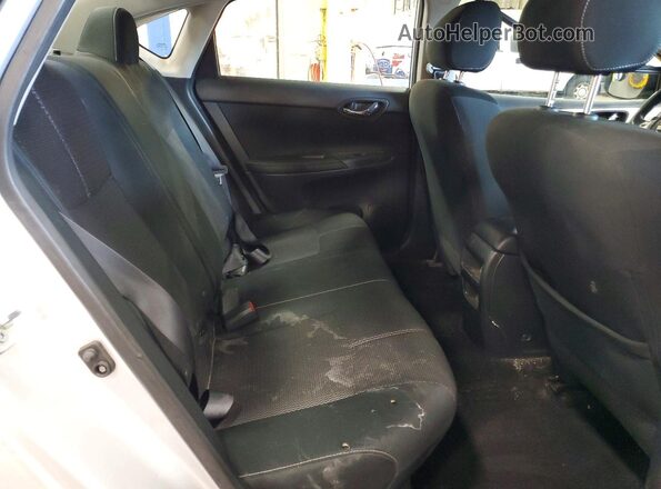 3N1AB7AP5JY228346 2018 NISSAN SENTRA Silver Rear seats view