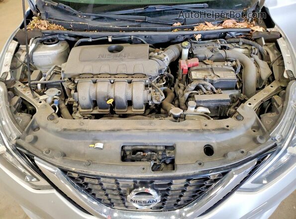 3N1AB7AP5JY228346 2018 NISSAN SENTRA Silver Rear interior view