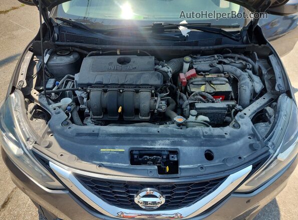 3N1AB7AP5JY306785 2018 NISSAN SENTRA Серебряный Вид задней части салона