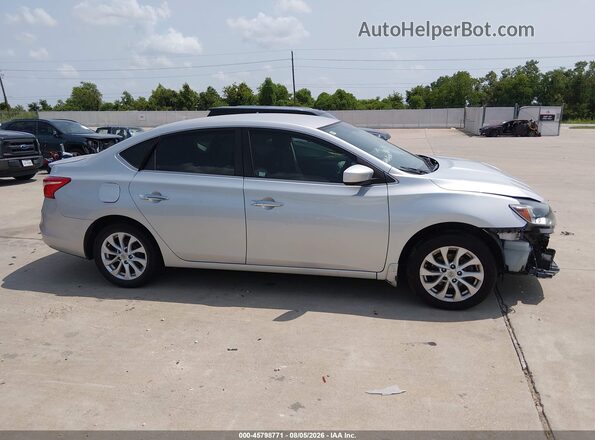 3N1AB7AP5KY221852 2019 NISSAN SENTRA Silver Вид задньої частини салону