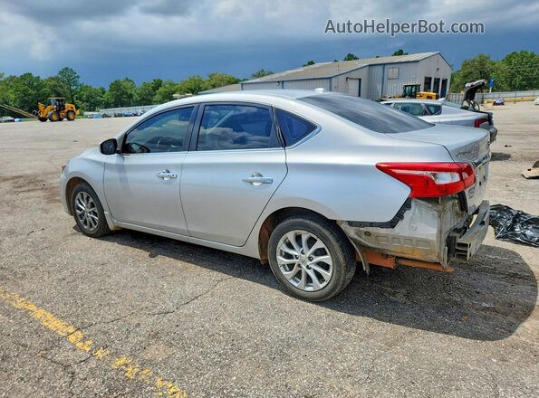 3N1AB7AP5KY408928 2019 NISSAN SENTRA Silver Trasero izquierdo