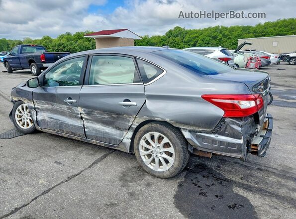 3N1AB7AP5KY416009 2019 NISSAN SENTRA Silver Trasero izquierdo