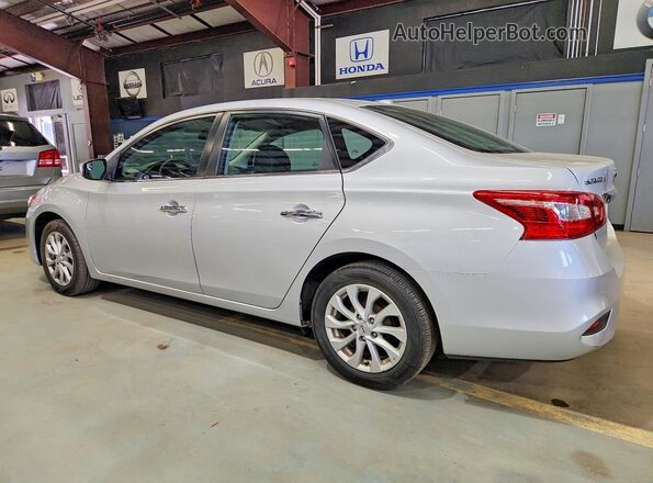 3N1AB7AP5KY432548 2019 NISSAN SENTRA Серебряный Задняя левая четверть