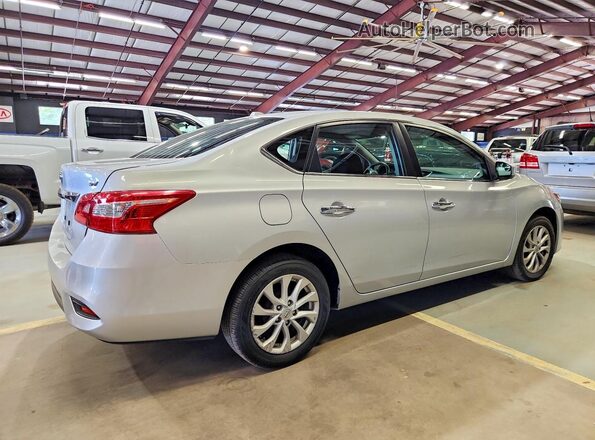 3N1AB7AP5KY432548 2019 NISSAN SENTRA Серебряный Задняя правая четверть