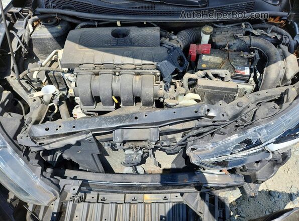 3N1AB7AP6HY332497 2017 NISSAN SENTRA Black Rear interior view