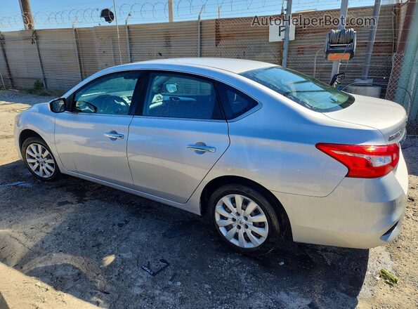 3N1AB7AP6JY247181 2018 NISSAN SENTRA Silver Trasero izquierdo