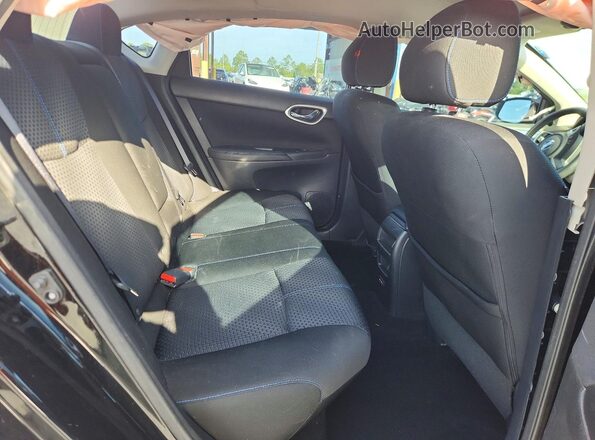 3N1AB7AP6JY265390 2018 NISSAN SENTRA Black Vista de los asientos traseros