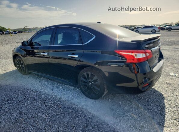 3N1AB7AP6JY265390 2018 NISSAN SENTRA Black Trasero izquierdo