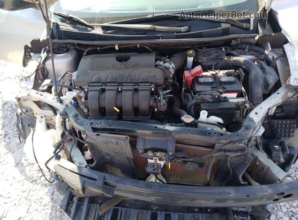 3N1AB7AP6JY276180 2018 NISSAN SENTRA Silver Rear interior view