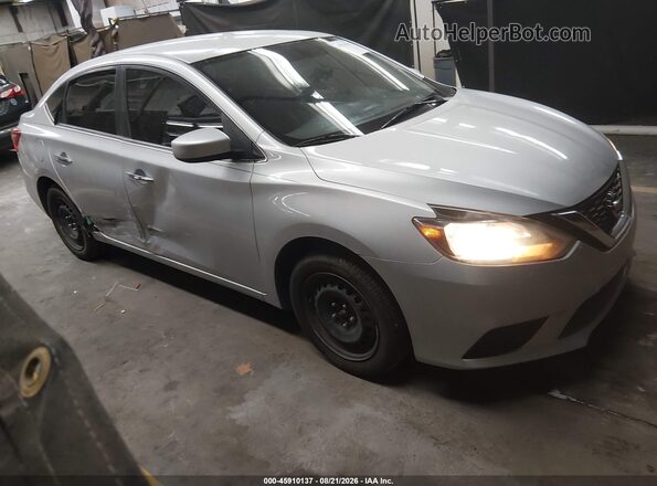 3N1AB7AP7HY404937 2017 NISSAN SENTRA Silver Widok wnętrza z tyłu