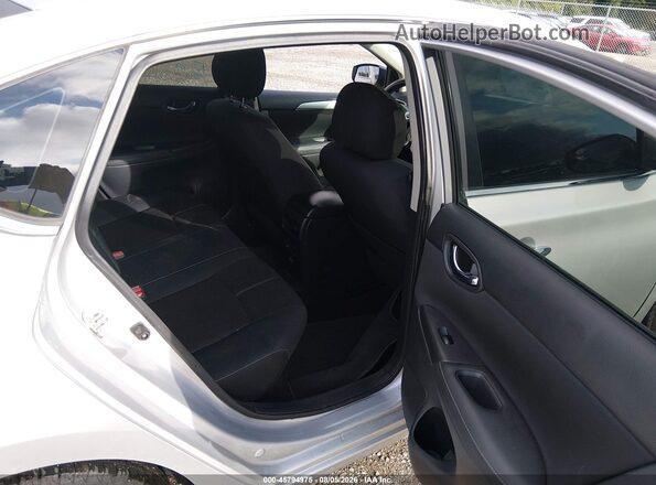 3N1AB7AP7JY214061 2018 NISSAN SENTRA Silver Vista de la etiqueta del VIN
