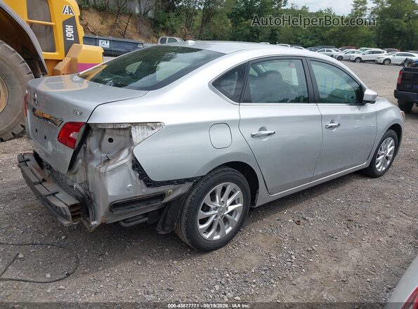3N1AB7AP7JY215923 2018 NISSAN SENTRA Silver Trasero derecho