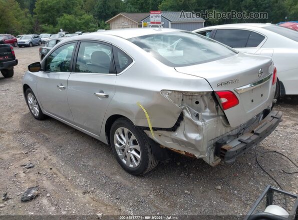 3N1AB7AP7JY215923 2018 NISSAN SENTRA Silver Trasero izquierdo