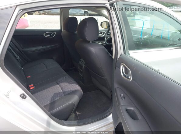 3N1AB7AP7JY215923 2018 NISSAN SENTRA Silver Vista de la etiqueta del VIN
