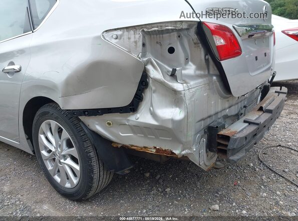 3N1AB7AP7JY215923 2018 NISSAN SENTRA Silver Vista interior trasera