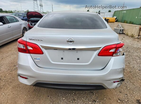 3N1AB7AP7JY217624 2018 NISSAN SENTRA Silver Rear view