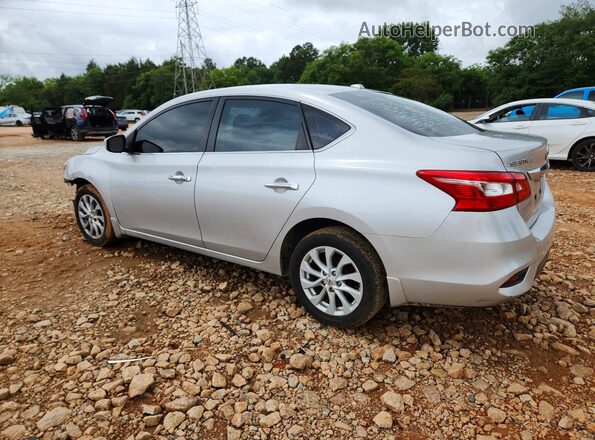 3N1AB7AP7JY220295 2018 NISSAN SENTRA Серебряный Задняя левая четверть