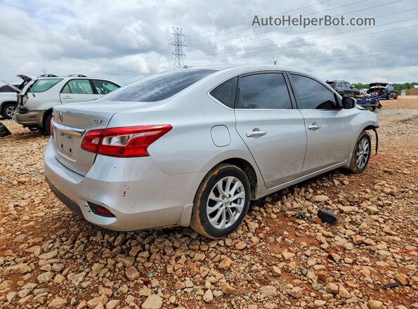 3N1AB7AP7JY220295 2018 NISSAN SENTRA Серебряный Задняя правая четверть