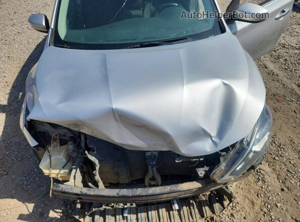 3N1AB7AP7JY308263 2018 NISSAN SENTRA Silver Widok wnętrza z tyłu