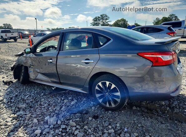 3N1AB7AP7KY210092 2019 NISSAN SENTRA Gray Trasero izquierdo