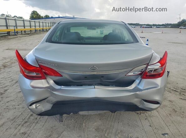 3N1AB7AP7KY251869 2019 NISSAN SENTRA Silver Rear view