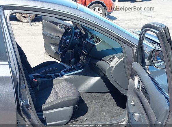 3N1AB7AP7KY408476 2019 NISSAN SENTRA Серый Вид салона спереди