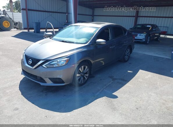 3N1AB7AP7KY408476 2019 NISSAN SENTRA Серый Передняя левая четверть