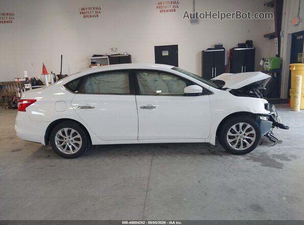 3N1AB7AP8JY218944 2018 NISSAN SENTRA White Widok wnętrza z tyłu