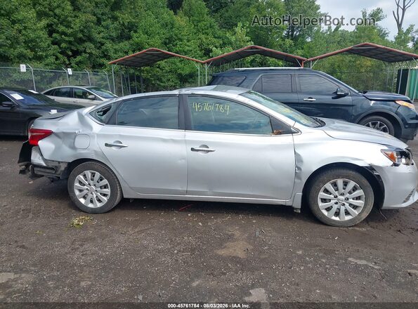 3N1AB7AP8JY268338 2018 NISSAN SENTRA Silver Rear interior view