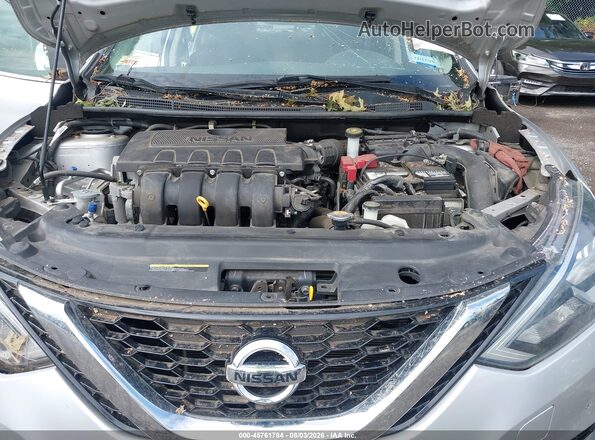 3N1AB7AP8JY268338 2018 NISSAN SENTRA Silver Rear view
